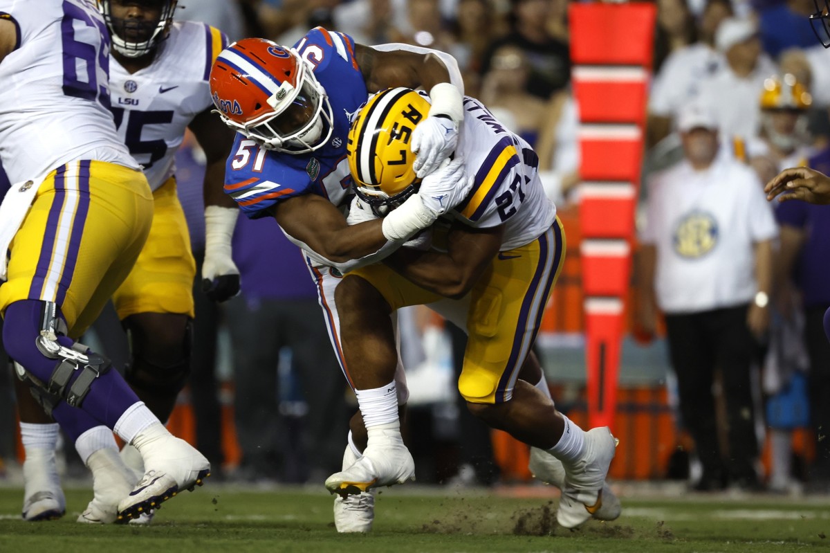 Florida Gators linebacker Ventrell Miller (51) tackles LSU Tigers running back Josh Williams (27). Mandatory Credit: Kim Klement-USA TODAY Sports